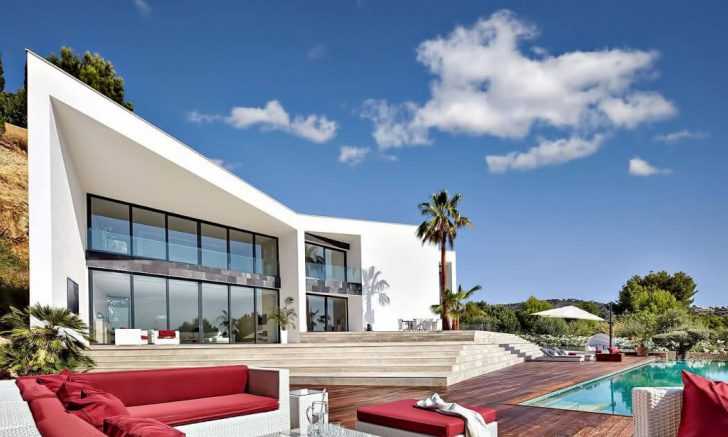 Фасад вілли: елегантність 2026 Елегантний фасад вілли Орігамі з великими панорамними вікнами, сучасний дизайн екстер'єру.