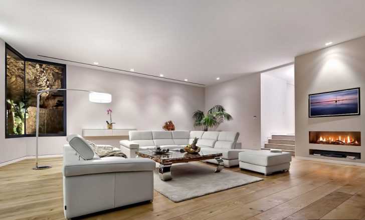 Гостина кімната: комфорт Інтер'єр гостиної кімнати у віллі, сучасний дизайн, комфортні меблі.