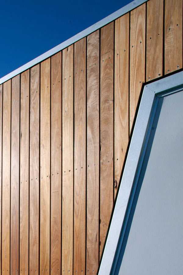 Архітектурний шедевр Сучасний дизайн заміського будинку 2026: дерев'яний фасад, великі вікна, Австралія.