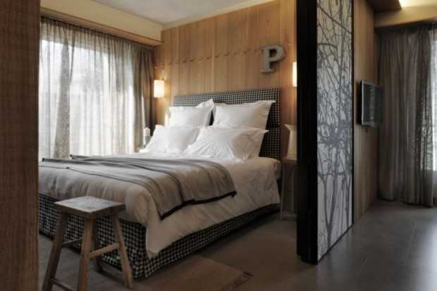 Обідній затишок 2026 Дизайн готелю 2026: обідня зона в сільському стилі з великим дерев'яним столом