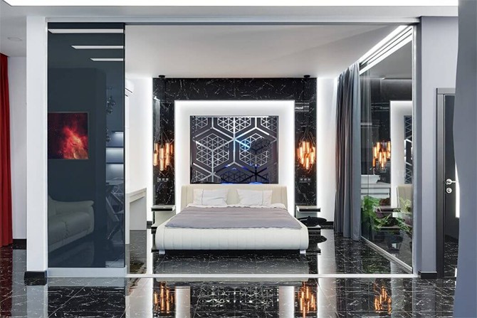 Затишна спальня Спальня в дизайні квартири 75 кв. м. з використанням спокійних тонів.