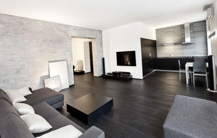 Меблі для мінімалізму Прості та функціональні меблі з гладкими фасадами в мінімалістичній вітальні.