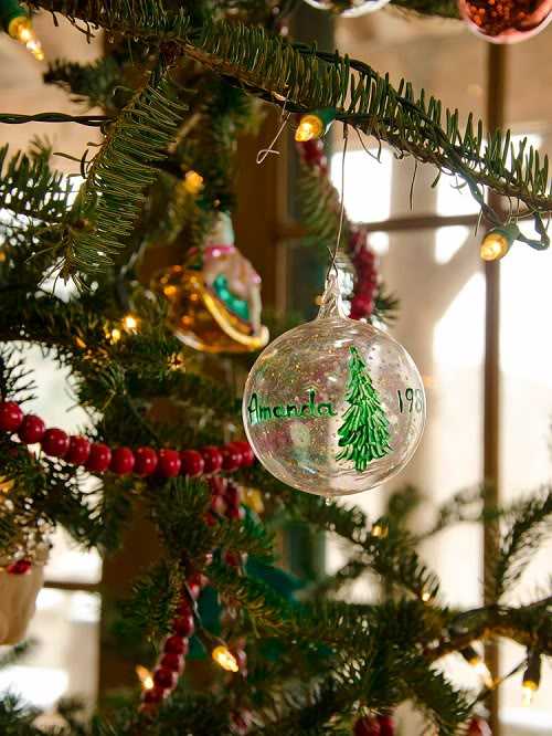 Vogue: Дім Аманди Брукс Стильний інтер'єр вітальні Аманди Брукс: елегантні меблі та різдвяний декор.