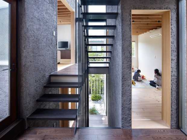 Дім Ogikubo: мінімалізм Інтер'єр Ogikubo House: японський мінімалізм, поєднання дерева та бетону в дизайні будинку в Токіо.
