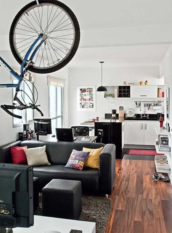 Сучасний простір Квартира-студія для молодого чоловіка: сучасний дизайн та функціональні рішення для сну та відпочинку.