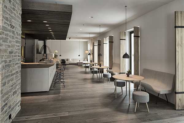 Зона релаксу Куточок відпочинку в гірському готелі Wiesergut з м'яким диваном та пледом