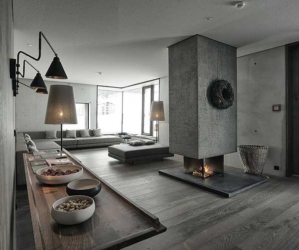 Мінімалістична спальня Сучасний мінімалістичний дизайн спальні в гірському готелі Wiesergut