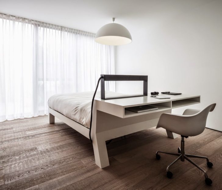 Стильне узголів'я Стильне узголів'я ліжка в спальні-кабінеті: елемент декору та функціональний акцент в інтер'єрі.