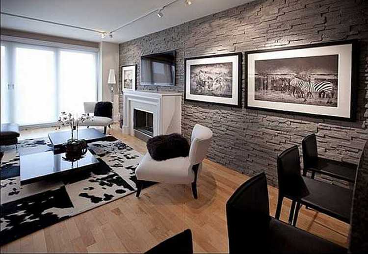 Камін і камінь Вітальня з каміном, оздобленим штучним каменем, затишний дизайн інтер'єру