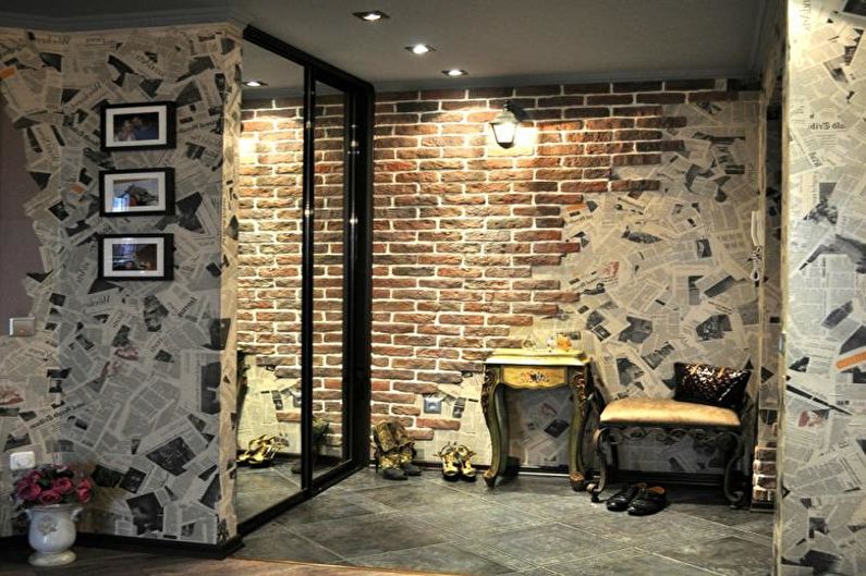 Стиль цегляної прихожої Стильний передпокій з цегляною стіною, що створює атмосферу комфорту та елегантності