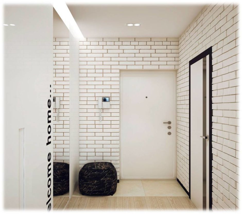 Затишок з цегляною стіною Затишний передпокій з цегляною обробкою, що демонструє сучасний дизайн інтер'єру.
