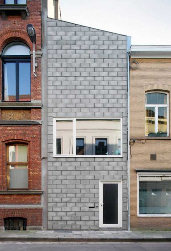Вузький дім у Генті Архітектура вузького будинку в Генті: винахідливе рішення з односхилим дахом