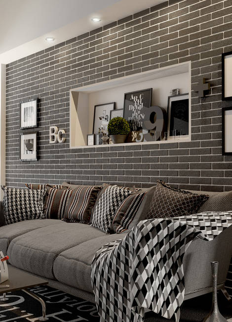 Цегла у вітальні Затишна вітальня з акцентною стіною, оздобленою плиткою під цеглу кольору слонової кістки.