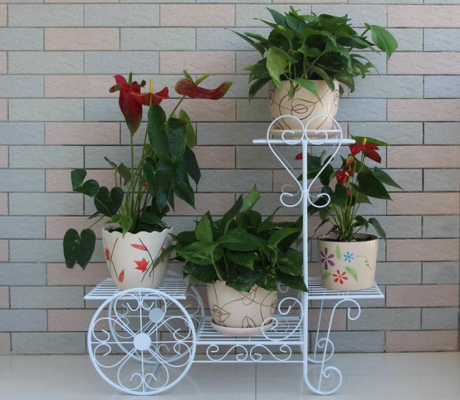 Квіткова вітальня Квіткова композиція на кованій підставці, оригінальний декор для вітальні.