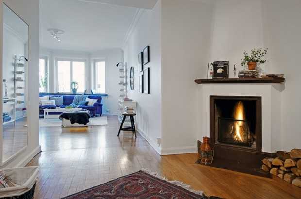 Скандинавський мінімалізм Інтер'єр скандинавської квартири: мінімалізм, світлі тони та функціональність.