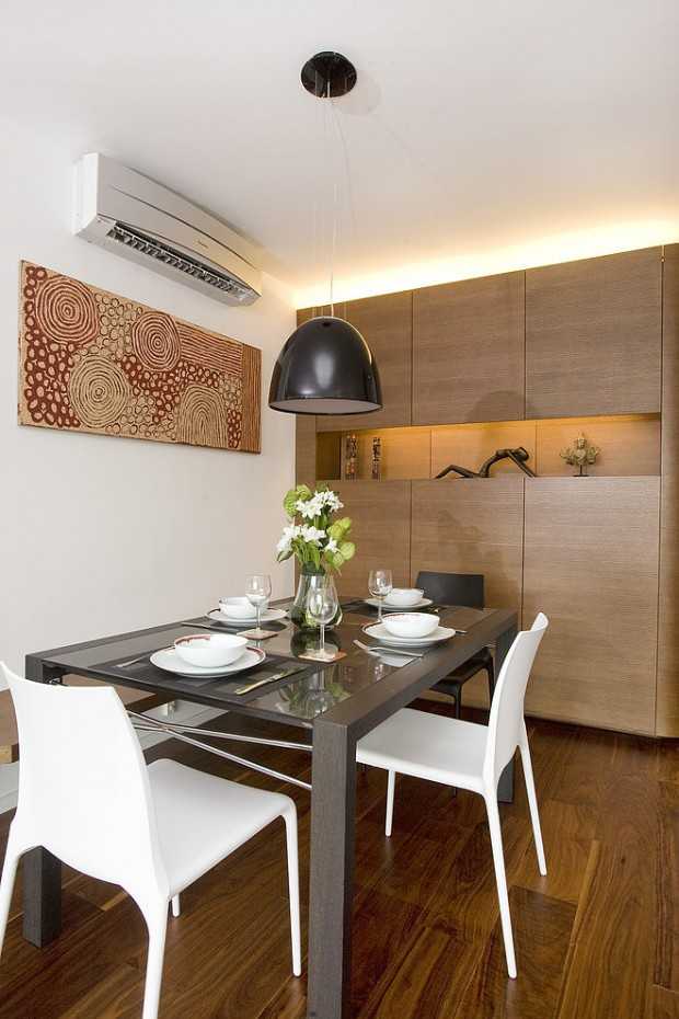 Непряме світло: Мінімалізм Квартира в стилі мінімалізм 2026: непряме освітлення підкреслює сучасний дизайн та форми.