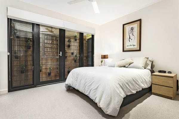 Простір та функціональність Дизайн невеликої площі 2026: сучасний будинок з продуманим використанням простору в Мельбурні.