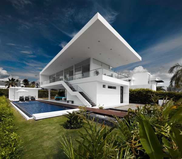 Світло і мінімалізм Інтер'єр у стилі мінімалізм 2026 в Колумбії з акцентом на великі вікна та природне освітлення.