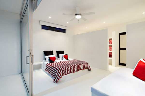 Колумбійський мінімалізм Сучасний мінімалістичний інтер'єр у Колумбії з великими вікнами, південноамериканський стиль 2026.