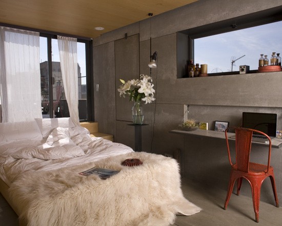 Темна спальня: стиль та затишок Елегантна спальня в темних тонах, що демонструє сучасне планування малогабаритного житла.