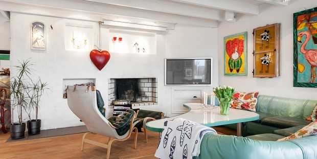 Яскравий скандинавський інтер'єр Скандинавський дизайн вітальні 2026 з використанням яскравих кольорів та текстур.