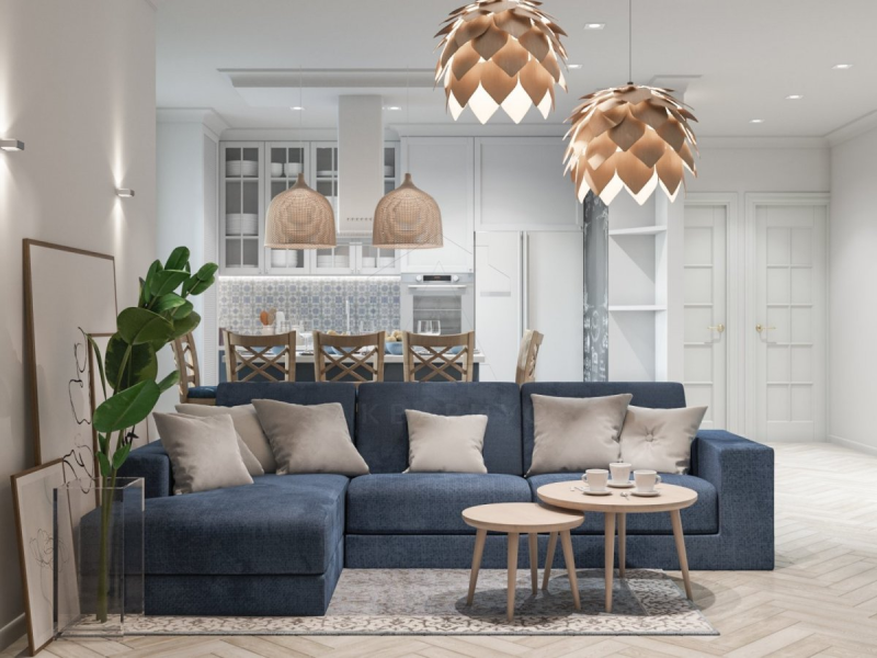 Затишок Середземномор'я Світла вітальня в середземноморському стилі з білими стінами та дерев'яними меблями.