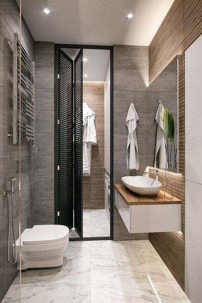 Затишна бежева ванна Бежево-коричнева ванна кімната з елегантними меблями та дзеркалом для створення затишної атмосфери.