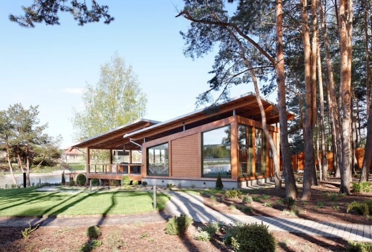 Склопакети: тепло та стиль Сучасні склопакети у дерев'яних рамах в скандинавському будинку, енергоефективність та стиль.