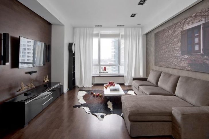 Мінімалізм в інтер'єрі Сучасний інтер'єр з акцентом на світлі кольори та мінімалізм для візуального розширення простору.